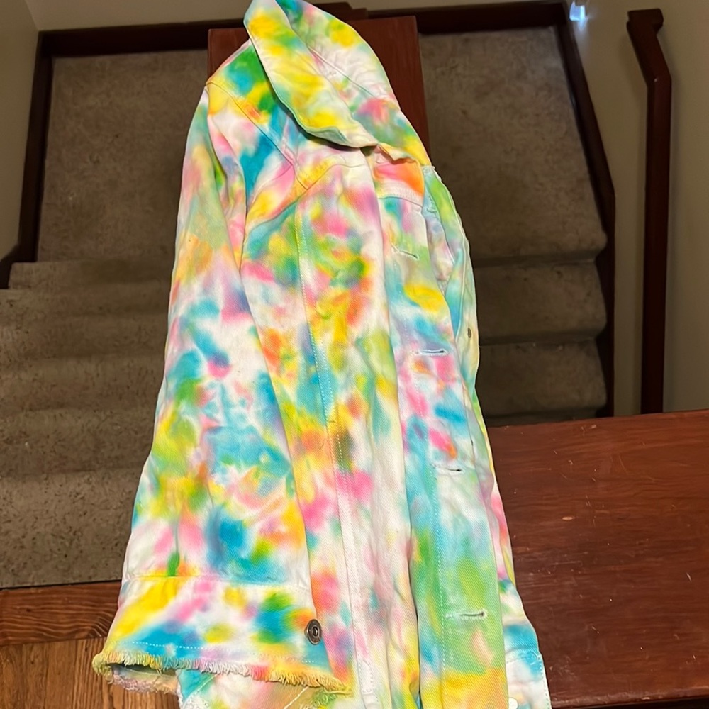 This is very colorful jacket that will go with a fun fit.